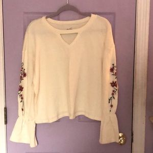 L off white dressy sweatshirt w/ floral